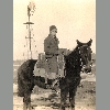 Edna M. "Myrle" Hawkins and her horse Rex / date unknown